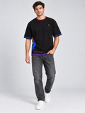 Loose Ends Atelier oversized cotton T-shirt — campaign on-model digital styling illustration with denim