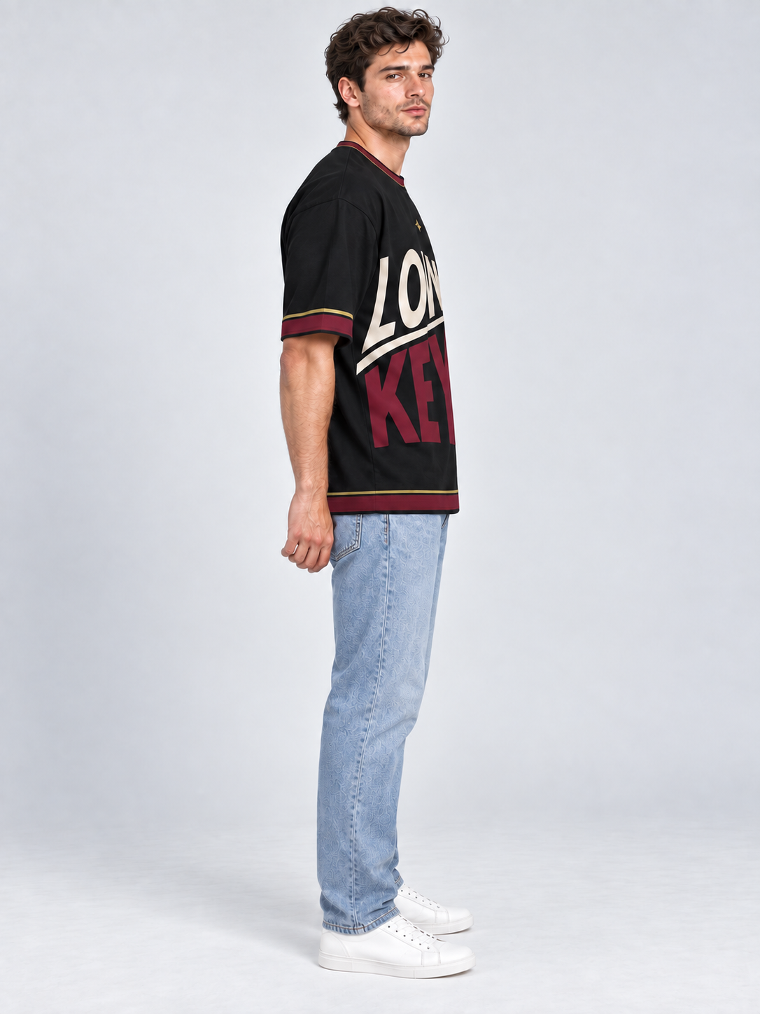 Low Key High Standard oversized cotton T-shirt — side on-model digital styling illustration with denim