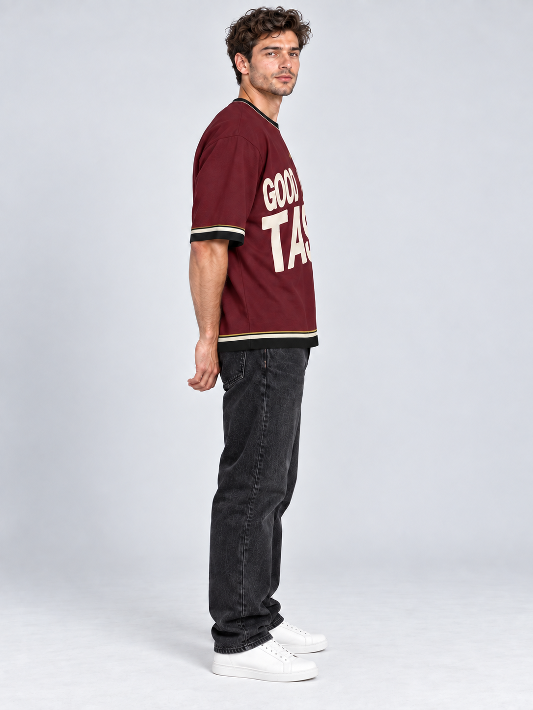 Good Taste Bad Timing oversized cotton T-shirt — side on-model digital styling illustration with denim