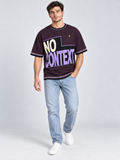 No Context Still Iconic oversized cotton T-shirt — campaign on-model digital styling illustration with denim