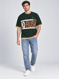No Rush Still Ahead oversized cotton T-shirt — campaign on-model digital styling illustration with denim