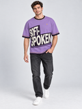 Soft Spoken oversized cotton T-shirt — campaign on-model digital styling illustration with denim