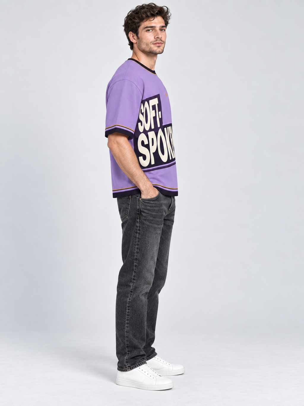 Soft Spoken oversized cotton T-shirt — side on-model digital styling illustration with denim