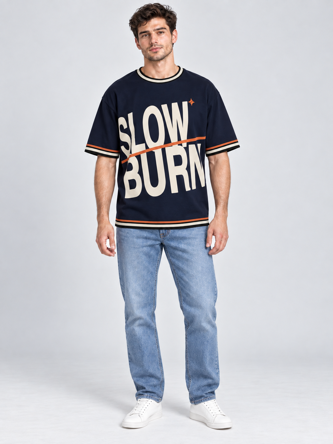 Slow Burn oversized cotton T-shirt — front on-model digital styling illustration with denim