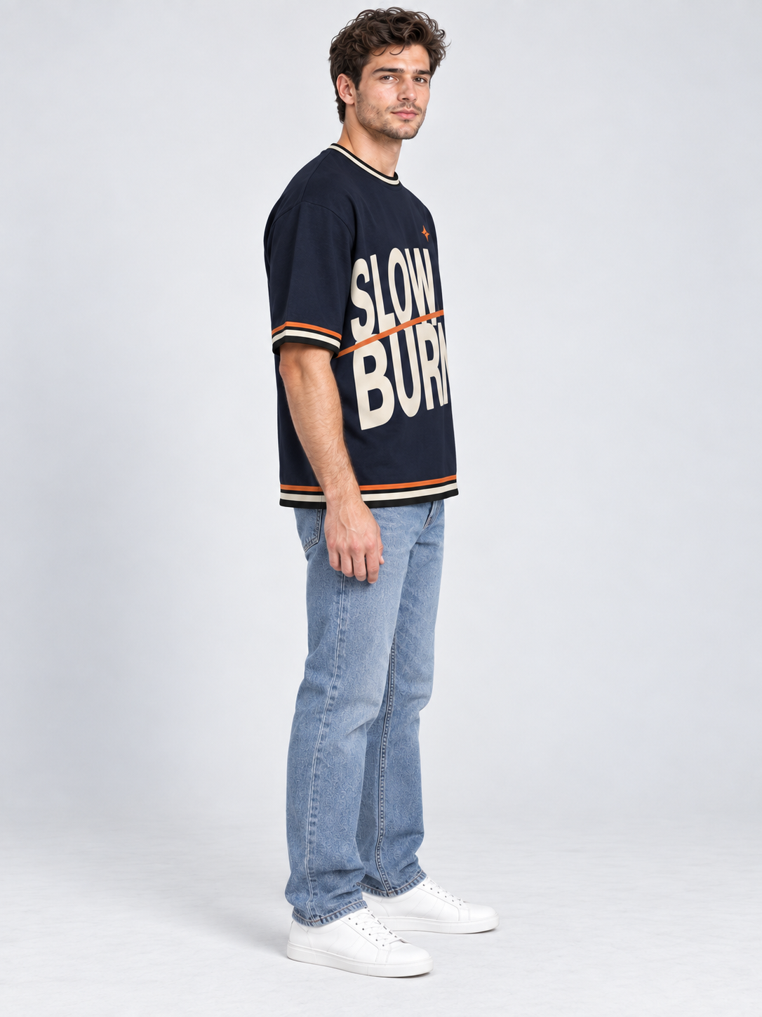 Slow Burn oversized cotton T-shirt — side on-model digital styling illustration with denim