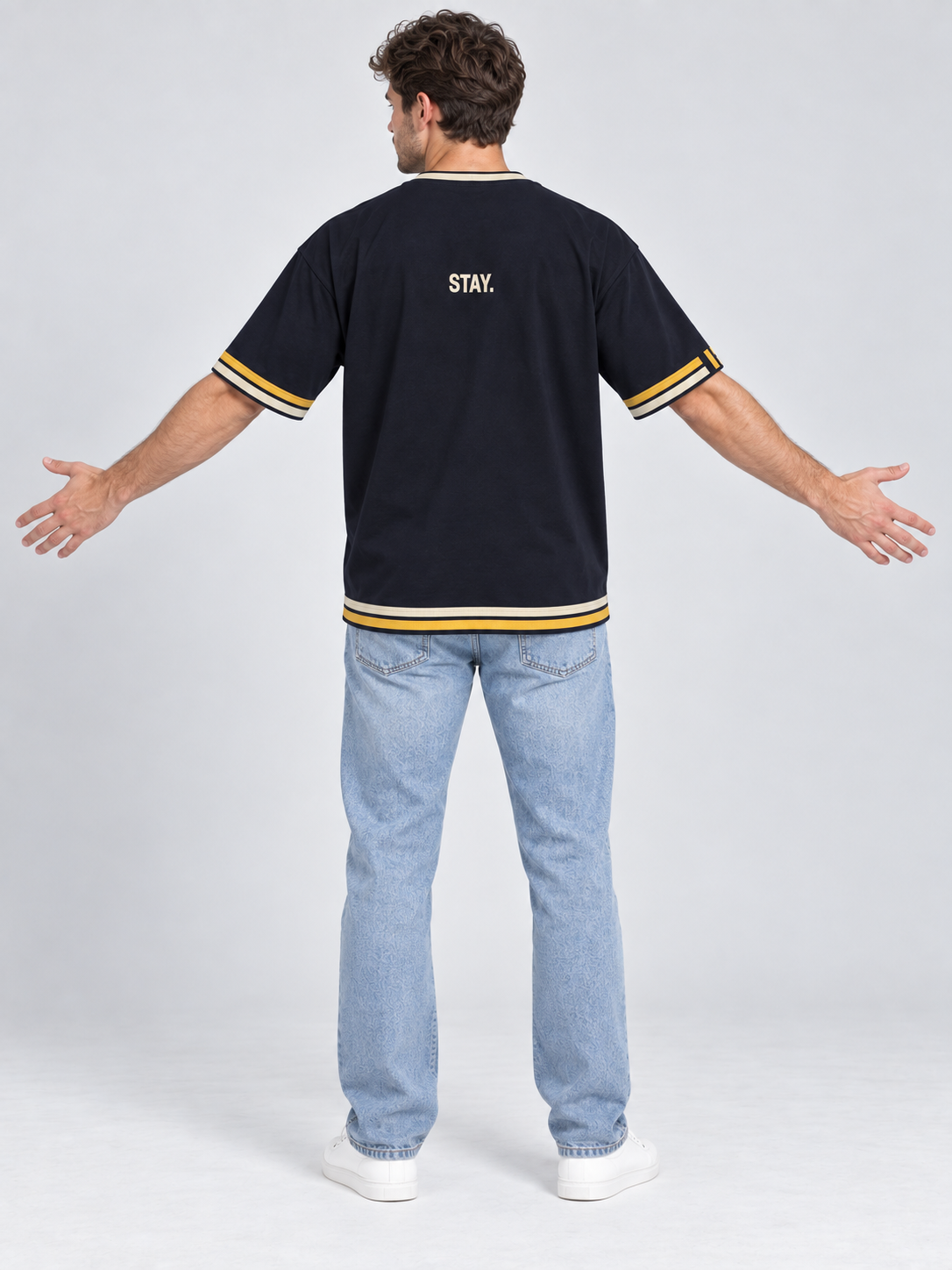 One More Hour oversized cotton T-shirt — back on-model digital styling illustration with denim
