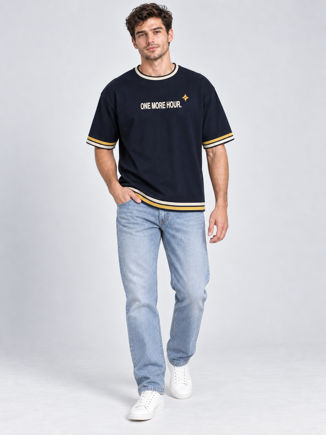 One More Hour oversized cotton T-shirt — campaign on-model digital styling illustration with denim