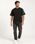 Cinder Inscription boxy cotton T-shirt — front on-model AI styling illustration