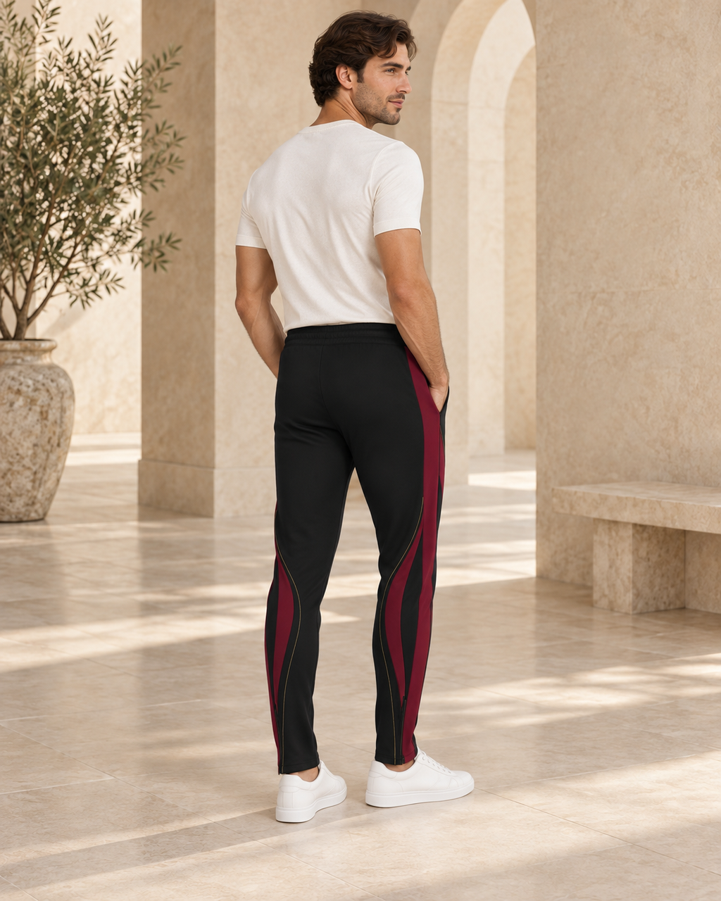 Black Cherry Luxury Rox Jersey Track Pants by UNIKCOSA — rear three-quarter model styling view