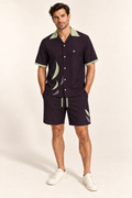 Black Cherry Pistachio cotton satin shirt and shorts set, front model view. AI-generated styling illustration.