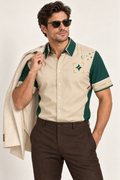 UNIKCOSA Jade Courtyard cotton satin shirt, editorial model view — AI styling illustration