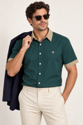 UNIKCOSA Teal Sand cotton satin shirt, editorial model view — AI styling illustration