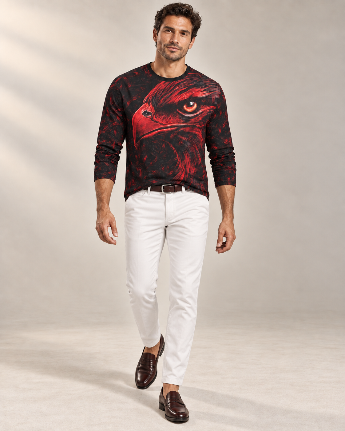 Crimson Falcon Luxury Long Sleeve T-Shirt by UNIKCOSA, front walking view with white tailored trousers and cherry-brown loafers — AI-generated model illustration