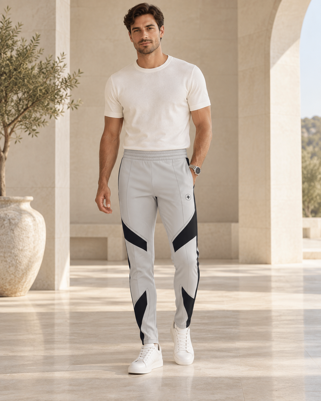 Dove Grey Luxury Rox Jersey Track Pants by UNIKCOSA — front model styling view