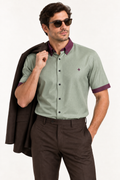 UNIKCOSA Sage Bordeaux silk satin button-down shirt — editorial AI-generated styling illustration