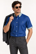 UNIKCOSA Cobalt Smoke silk satin button-down shirt — editorial AI-generated styling illustration