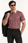 UNIKCOSA Rosewood Pearl — 100% Silk Satin Button-Down Shirt, tucked styling with coordinated trousers and jacket; AI-generated model illustration.