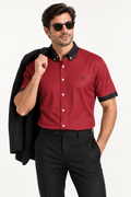 UNIKCOSA Cherry Noir 100% Silk Satin Button-Down Shirt, tucked styling with coordinated trousers and jacket; AI-generated model illustration.
