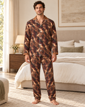 Adult model wearing the Ember Paisley Luxury Pajama Set in a bright bedroom — AI styling illustration