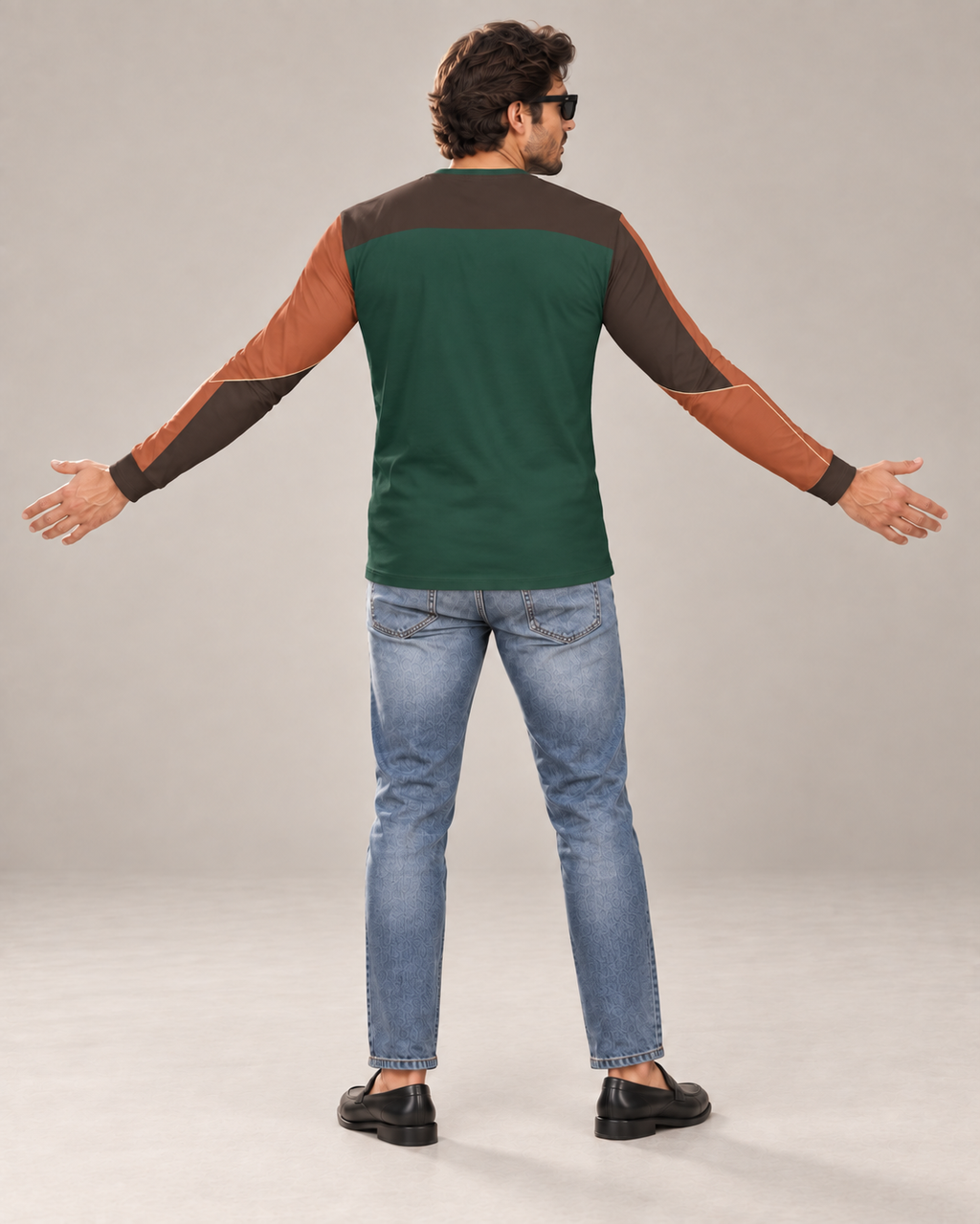 Emerald Sienna Luxury Bounce Cotton Long Sleeve T-Shirt by UNIKCOSA, back view with arms spread wide in a plain indoor studio — AI styling visual
