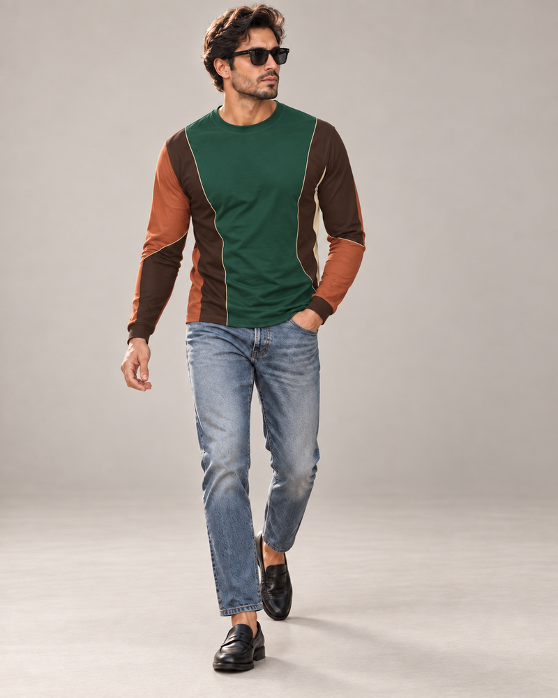 Emerald Sienna Luxury Bounce Cotton Long Sleeve T-Shirt by UNIKCOSA, walking in a plain indoor studio with straight jeans and black loafers — AI styling visual