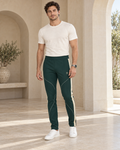 Forest Teal Luxury Rox Jersey Track Pants by UNIKCOSA — front model styling view