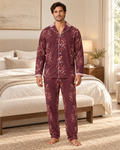 Adult model wearing the Garnet Scroll Luxury Pajama Set in a bright bedroom — AI styling illustration