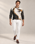 Ivory Eagle Luxury Long Sleeve T-Shirt by UNIKCOSA, front walking view with white tailored trousers and cherry-brown loafers — AI-generated model illustration