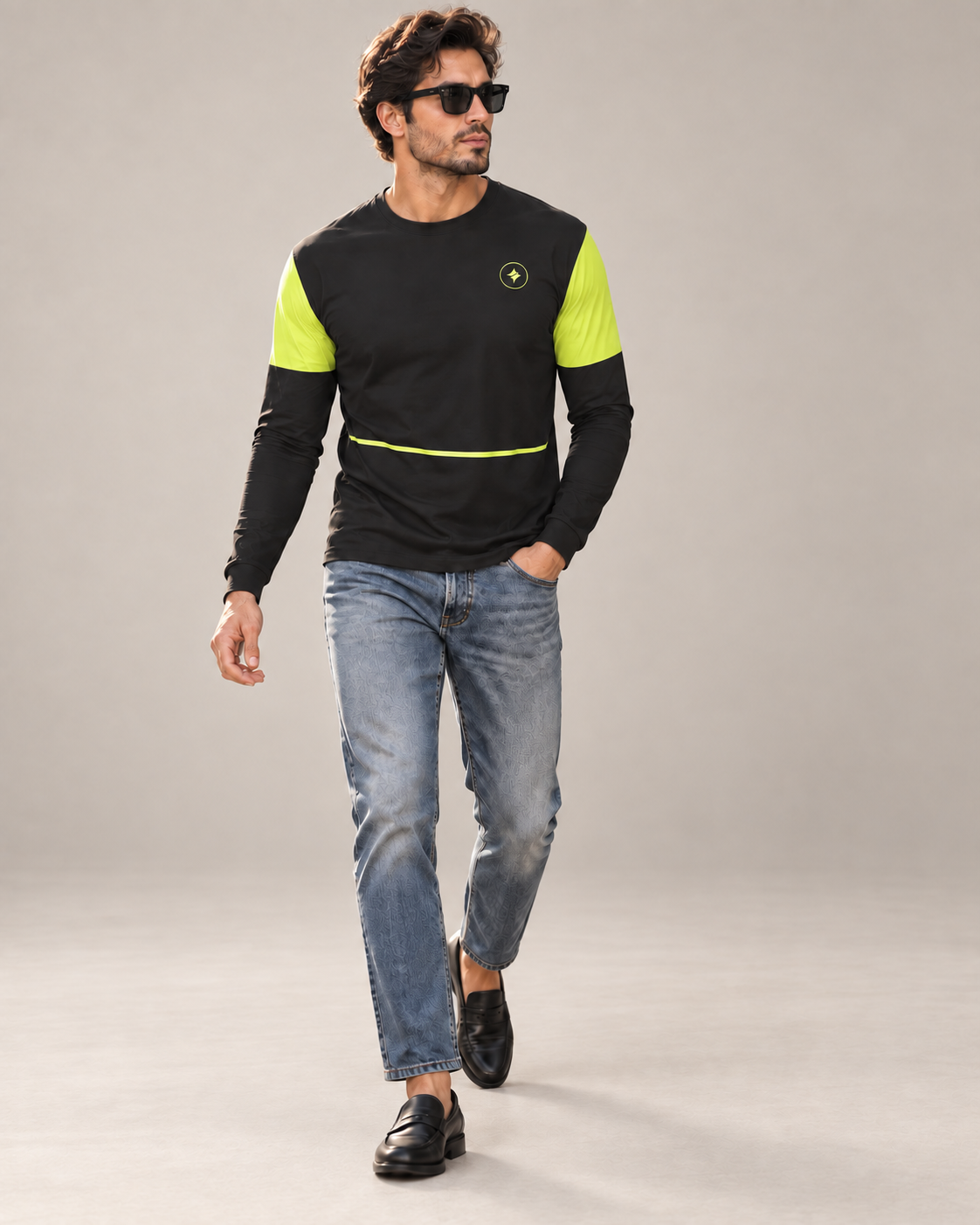 Neon Pulse Luxury Bounce Cotton Long Sleeve T-Shirt by UNIKCOSA, walking in a plain indoor studio with straight jeans and black loafers — AI styling visual