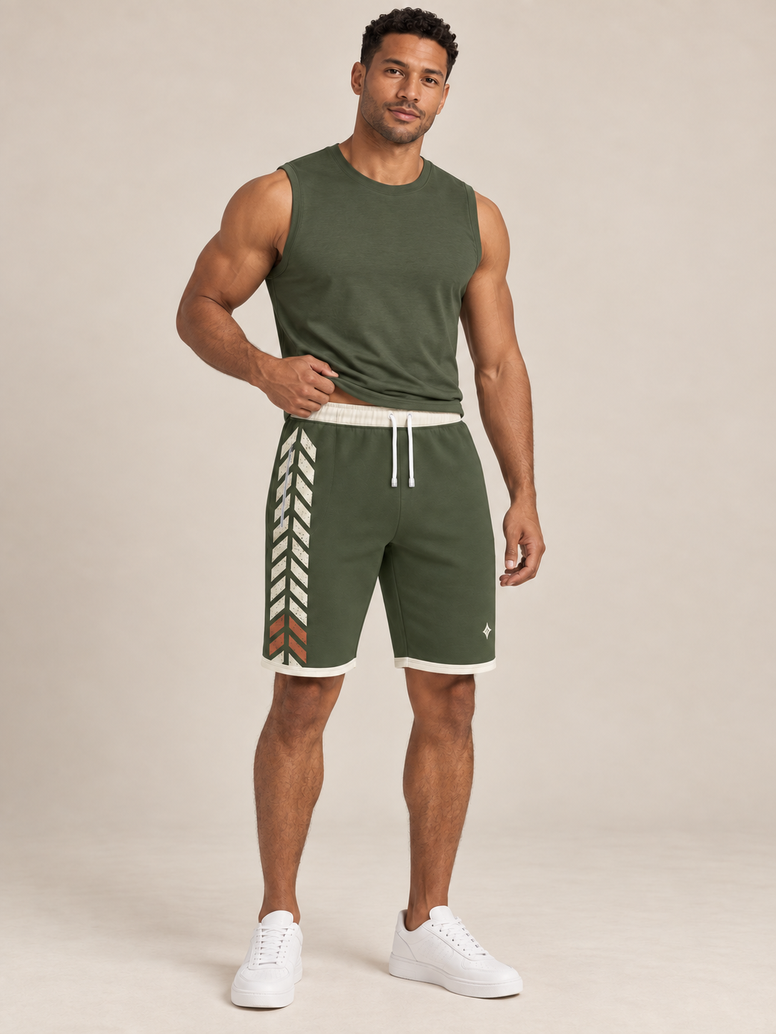 AI-generated styling illustration: adult male wearing UNIKCOSA Olive Trail Chevron shorts with a coordinated fitted sleeveless top, gently lifting its hem to show the waistband.