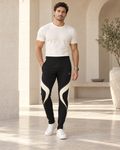 Onyx Ivory Luxury Rox Jersey Track Pants by UNIKCOSA — front model styling view