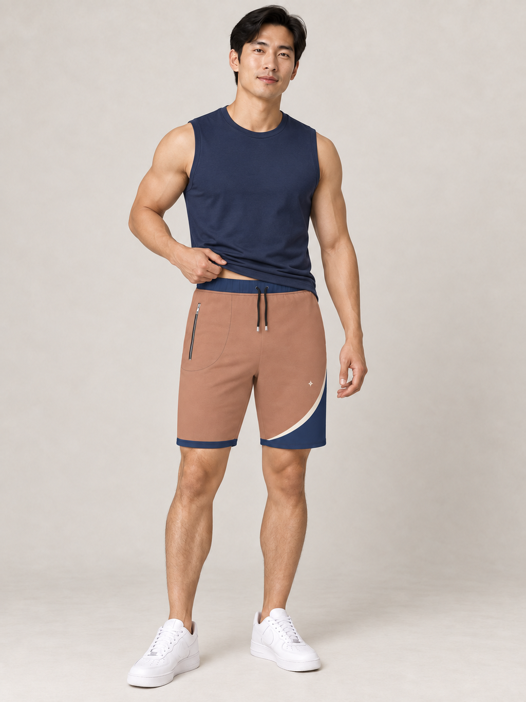 AI-generated styling illustration: adult male wearing UNIKCOSA Terracotta Indigo Arc shorts with a coordinated fitted sleeveless top, gently lifting its hem to show the waistband.