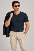 Midnight Brass Tessera V-Neck Cotton T-Shirt by UNIKCOSA — dressed-up styling; AI-generated styling illustration.