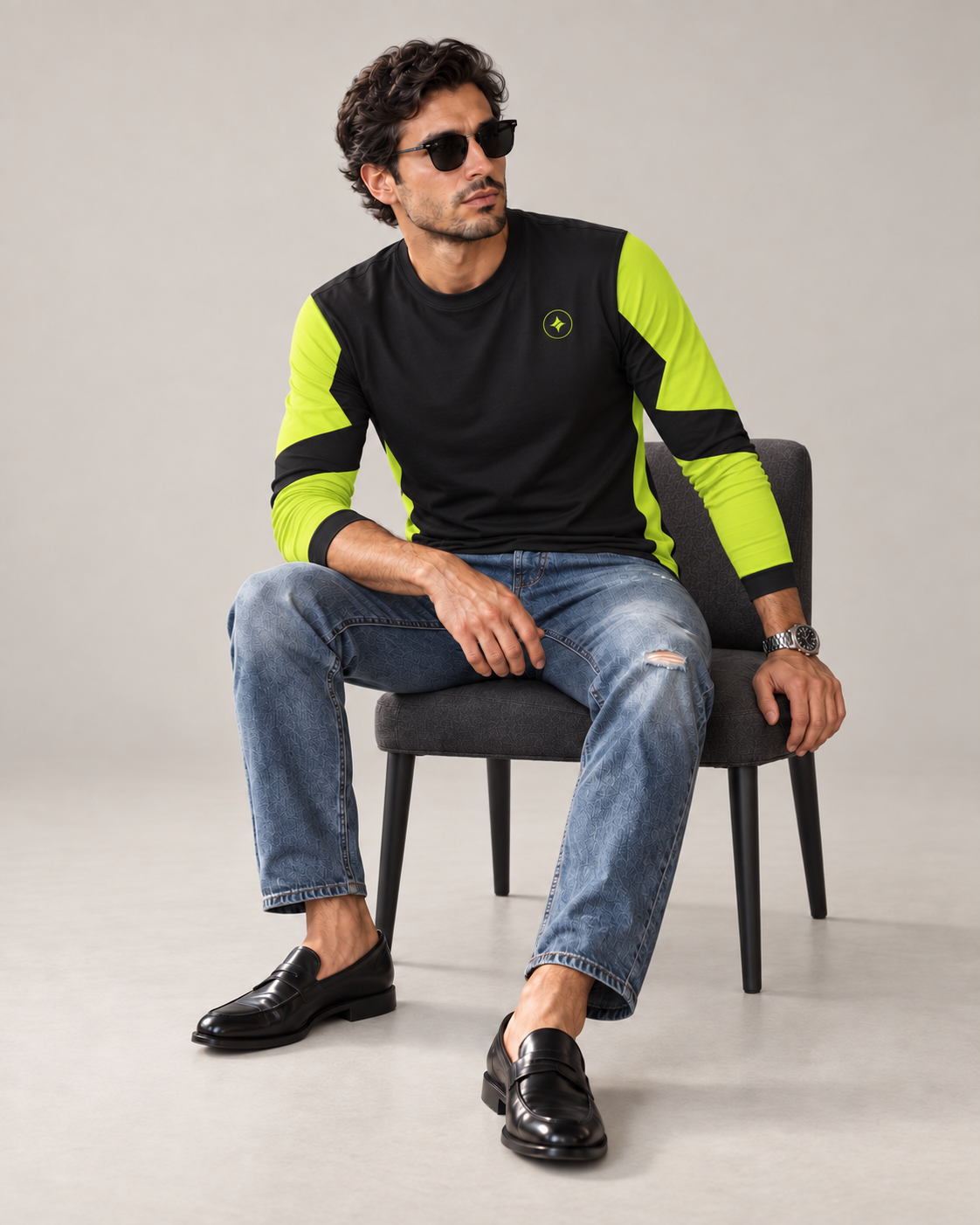 Volt Matrix Luxury Bounce Cotton Long Sleeve T-Shirt by UNIKCOSA — seated with styled sleeves in a plain indoor studio — AI styling visual