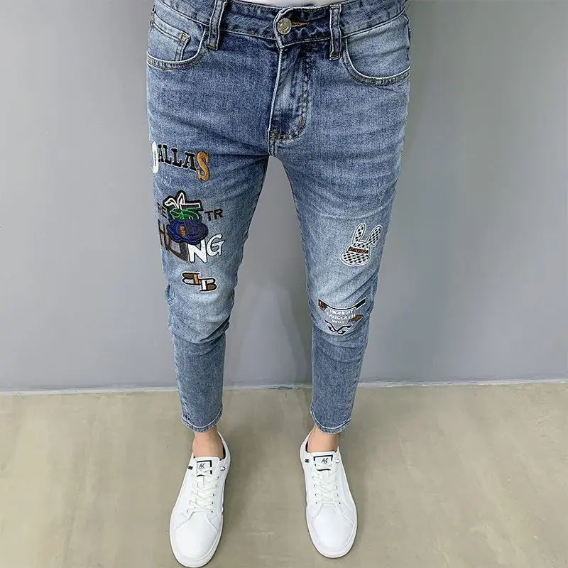 UNIKCOSA Men’s Slim Embroidered Jeans – Luxury Korean Fashion Pencil Pants (2024 Autumn/Summer Edition)