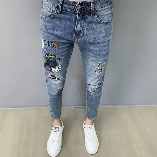 UNIKCOSA Men’s Slim Embroidered Jeans – Luxury Korean Fashion Pencil Pants (2024 Autumn/Summer Edition)