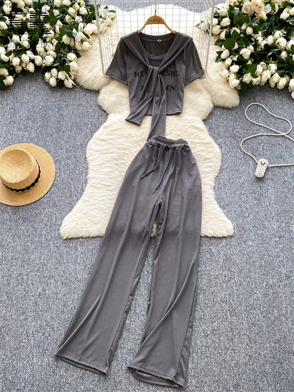 UNIKCOSA’s 3-Piece Streetwear Set — Letter Print Tee + Elastic Pants + Solid Shawl