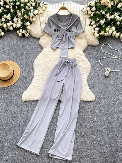 UNIKCOSA’s 3-Piece Streetwear Set — Letter Print Tee + Elastic Pants + Solid Shawl