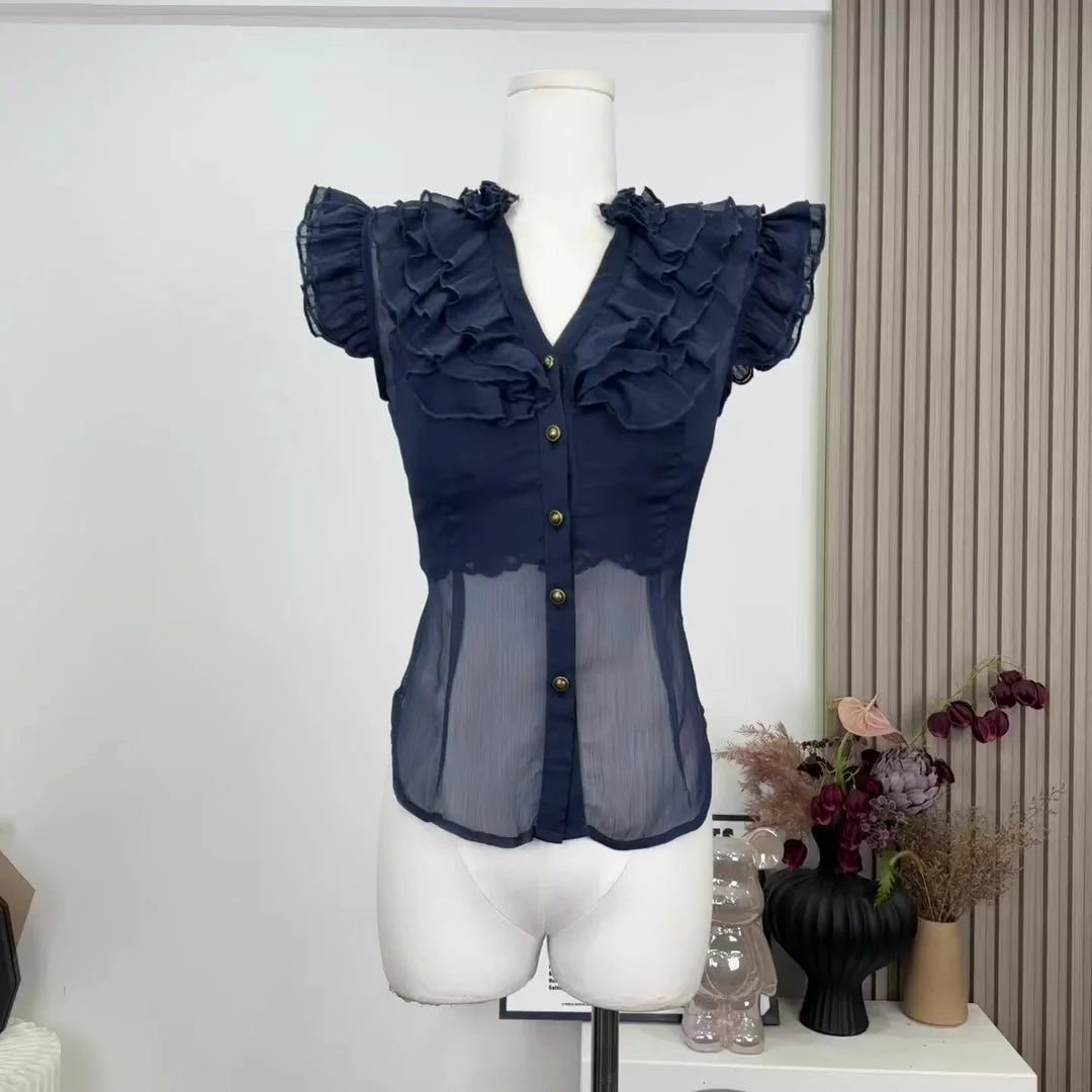 UNIKCOSA’s 2025 French Vintage Ruffle Blouse — Sleeveless V-Neck Coquette Chic