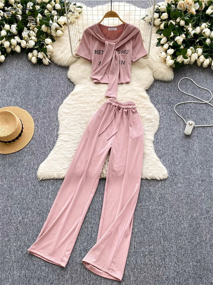 UNIKCOSA’s 3-Piece Streetwear Set — Letter Print Tee + Elastic Pants + Solid Shawl