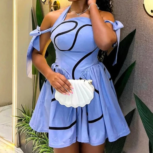 UNIKCOSA™ 2025 Summer Bowknot Halter Dress – Women’s Geometric Striped Swing Dress | Elegant Streetwear & Party Outfit