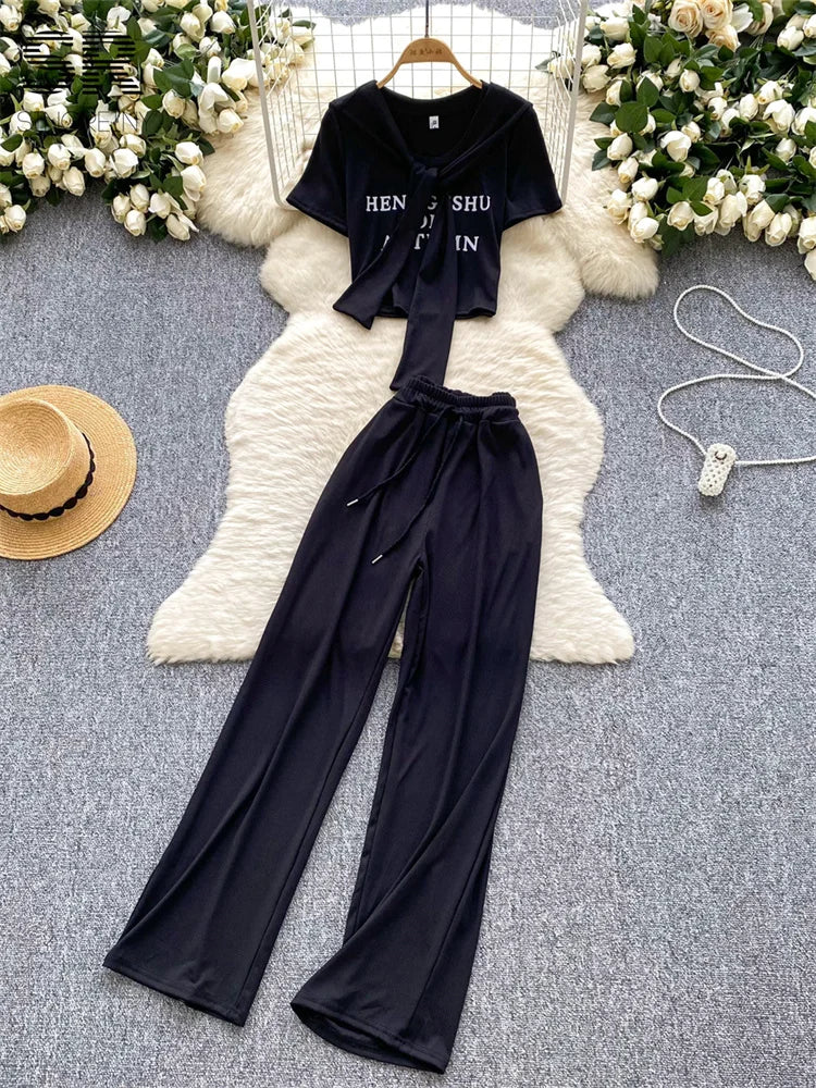 UNIKCOSA’s 3-Piece Streetwear Set — Letter Print Tee + Elastic Pants + Solid Shawl