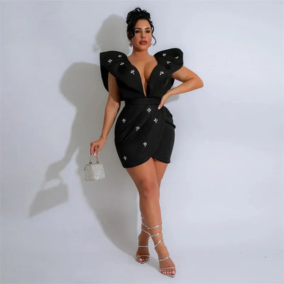 UNIKCOSA’s Rhinestone Ruched Mini Dress — Deep V Backless Party Glam with Flying Sleeves