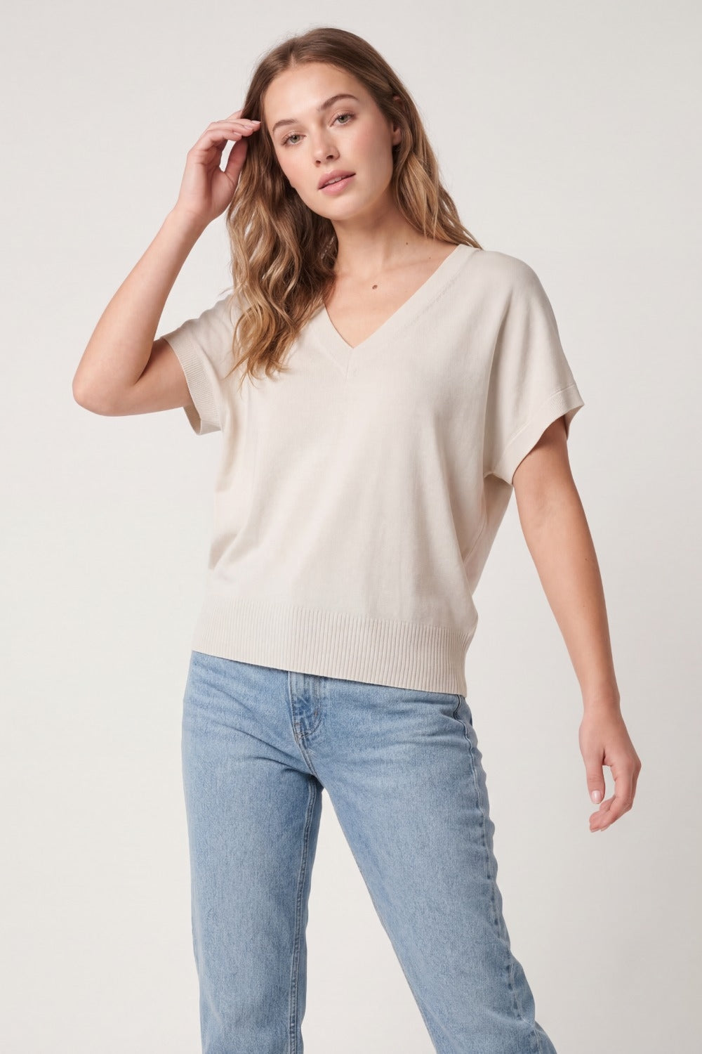 V-Neck Relaxed fine Fit Knit sweater in beige color