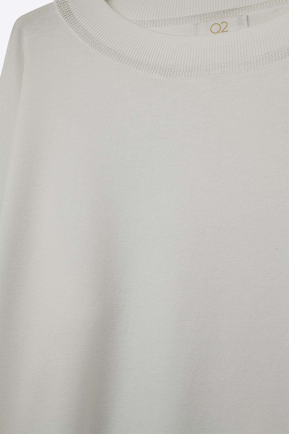 White knit sweater with mesh collar detail