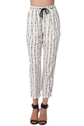 Q2 Cream pants with contrast geo-tribal print