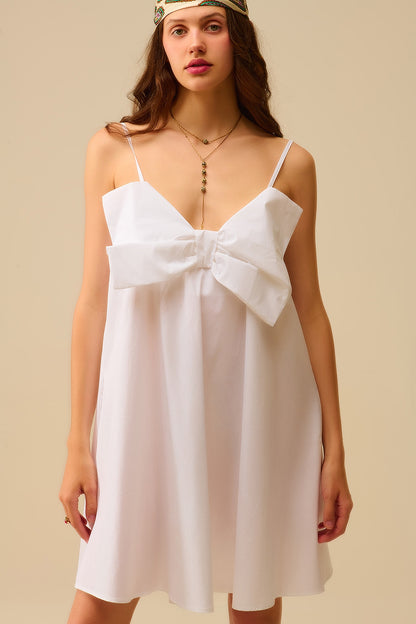 White poplin mini dress with a big bow detail