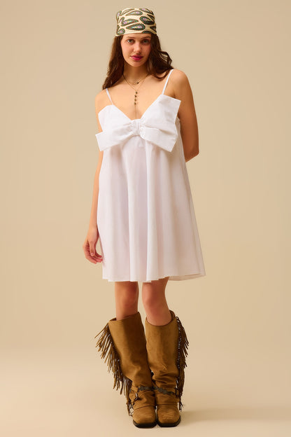 White poplin mini dress with a big bow detail