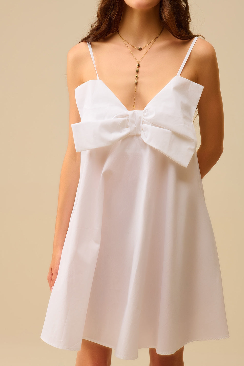 White poplin mini dress with a big bow detail