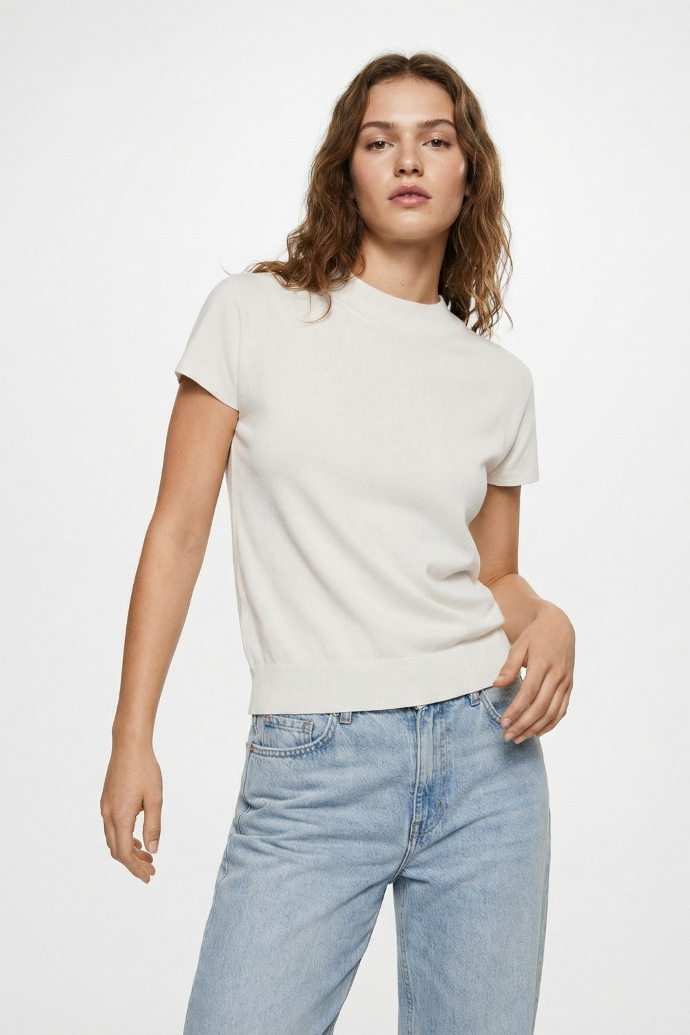 White turtleneck sweater with fitted short sleeves